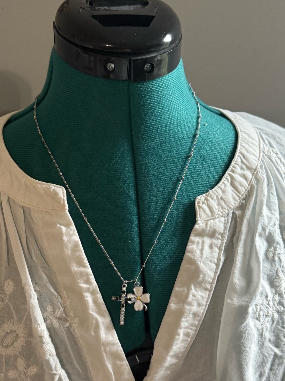 Silvertone cross & flower necklace